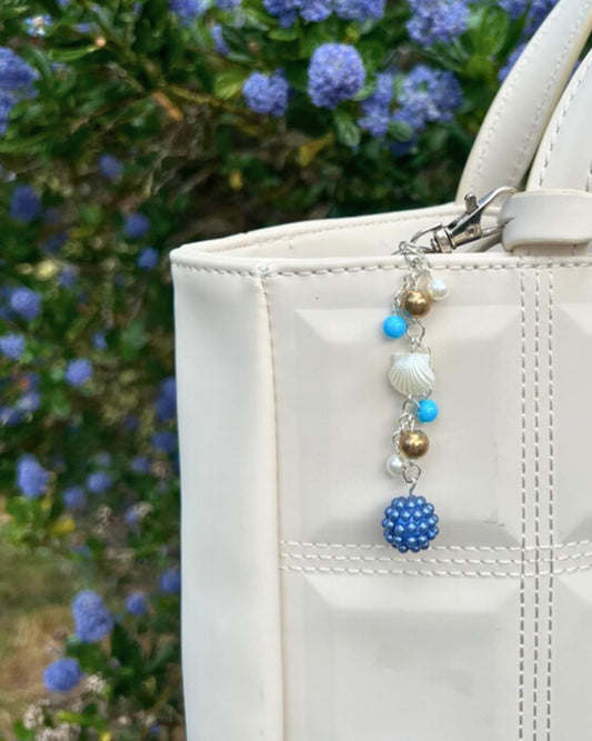 Oscar bag charm
